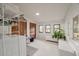 Large laundry room with storage, natural light, and modern washer and dryer at 3589 Walter Dr, Johns Island, SC 29455