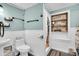 Charming bathroom with wainscoting, decorative shelves, and a step-in shower at 407 Palmetto Blvd, Edisto Beach, SC 29438