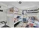 Nautical themed bunk bedroom with 2 beds, colorful decor and marine themed details at 407 Palmetto Blvd, Edisto Beach, SC 29438