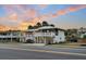A street view of the property that shows balconies and decks where the sunset can be enjoyed at 407 Palmetto Blvd, Edisto Beach, SC 29438