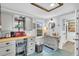 Efficient kitchenette featuring gray cabinets, butcher block counters and lots of natural light at 407 Palmetto Blvd, Edisto Beach, SC 29438