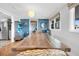 Open living area with dining table and coastal decor at 407 Palmetto Blvd, Edisto Beach, SC 29438