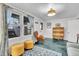 Inviting living area with ample natural light, plush seating, and stylish decor at 407 Palmetto Blvd, Edisto Beach, SC 29438