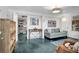 Comfortable living room with stylish decor, including a plush sofa and nautical-themed artwork at 407 Palmetto Blvd, Edisto Beach, SC 29438