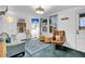 Bright living room with a comfortable seating area and a view of the neighborhood at 407 Palmetto Blvd, Edisto Beach, SC 29438