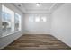 Bright, sun-filled bedroom with hardwood floors, tray ceiling and ample natural light at 4432 Oakwood Ave, North Charleston, SC 29405
