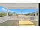 A rear deck overlooks a field and trees at 4432 Oakwood Ave, North Charleston, SC 29405