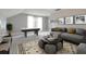 Spacious game room with a comfortable sofa, air hockey table, and natural light at 478 Rowley Ln, Summerville, SC 29486