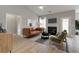 Bright living room features a fireplace, ceiling fan, neutral paint, and stylish furniture at 478 Rowley Ln, Summerville, SC 29486