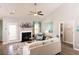 A contemporary living room features a fireplace and a cozy seating area with large windows at 478 Rowley Ln, Summerville, SC 29486
