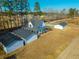 Lovely home nestled among mature trees with a detached garage, with neighborhood homes being constructed nearby at 516 & 508 Robnshers Pl, Ridgeville, SC 29472