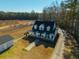 A beautiful home with mature trees, a long drive, and a detached garage, offering privacy and space at 516 & 508 Robnshers Pl, Ridgeville, SC 29472