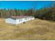 Wide aerial view of the home, showcasing the spacious yard and serene surrounding landscape at 516 & 508 Robnshers Pl, Ridgeville, SC 29472