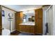 Well-lit bathroom with double sinks, generous storage, and tiled walls for a clean, modern look at 516 & 508 Robnshers Pl, Ridgeville, SC 29472