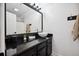 Contemporary bathroom featuring a black vanity with a vessel sink and a large mirror at 516 & 508 Robnshers Pl, Ridgeville, SC 29472