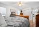 Comfortable primary bedroom with a ceiling fan, natural light, and wood flooring at 516 & 508 Robnshers Pl, Ridgeville, SC 29472