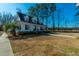 Charming two-story home with a welcoming front porch and manicured lawn, offering timeless appeal and curb appeal at 516 & 508 Robnshers Pl, Ridgeville, SC 29472