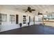 Inviting covered front porch with ceiling fans, offering a relaxing outdoor space and charming curb appeal at 516 & 508 Robnshers Pl, Ridgeville, SC 29472