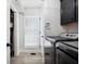 Neat laundry room equipped with modern washer and dryer, storage shelves, and a window for natural light at 516 & 508 Robnshers Pl, Ridgeville, SC 29472
