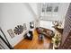 Bright living room with cathedral ceiling, large windows, and a beautiful brick fireplace at 516 & 508 Robnshers Pl, Ridgeville, SC 29472