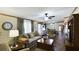 Inviting living room with cozy seating, wood-look flooring, and warm ambiance, creating a welcoming atmosphere at 516 & 508 Robnshers Pl, Ridgeville, SC 29472