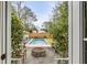 Inviting backyard with a pool, fire pit, and lush landscaping at 521 London Bridge Rd, Mount Pleasant, SC 29464