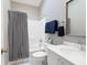 Bright bathroom featuring a shower, toilet, and vanity with ample counter space at 652 E Hobcaw Dr, Mount Pleasant, SC 29464