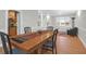 Dining room with hardwood floors, natural light, and a view into other living spaces at 652 E Hobcaw Dr, Mount Pleasant, SC 29464