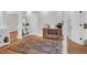 Inviting entryway with hardwood floors, decorative rug, and stylish furnishings at 652 E Hobcaw Dr, Mount Pleasant, SC 29464