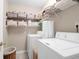 Functional laundry room with washer, dryer, and plenty of storage space at 652 E Hobcaw Dr, Mount Pleasant, SC 29464