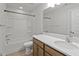 Bathroom featuring quartz countertops, ample cabinet space, and a bath and shower combo at 7806 Park Gate Dr, North Charleston, SC 29418