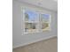Bright bedroom with two windows that allow natural light to fill the space at 7806 Park Gate Dr, North Charleston, SC 29418