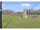 The community entrance is marked by a stone sign and landscaped grass at 7806 Park Gate Dr, North Charleston, SC 29418