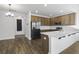 Well-lit open concept kitchen with stainless steel appliances and stylish countertops at 7806 Park Gate Dr, North Charleston, SC 29418