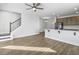 Bright living space with a staircase, hardwood floors, and an open-concept design at 7806 Park Gate Dr, North Charleston, SC 29418