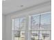 Window view of a lovely neighborhood with lush trees that filter in the natural light at 7806 Park Gate Dr, North Charleston, SC 29418