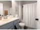 Bathroom featuring a single sink with modern fixtures and a bathtub with a shower curtain at 9715 Brandishing Rd, Ladson, SC 29456