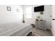 Bedroom featuring a TV, a large window and a decorative rug at 9715 Brandishing Rd, Ladson, SC 29456