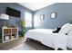 Bedroom featuring stylish decor, a side table and a TV on the wall at 9715 Brandishing Rd, Ladson, SC 29456