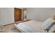 Simple bedroom with a natural wood frame bed, plush carpet, and a glimpse of the closet at 102 Eastover Cir, Summerville, SC 29483