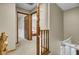 Hallway features an open doorway with a view to a bedroom and white washer and dryer at 102 Eastover Cir, Summerville, SC 29483