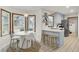 Charming eat-in kitchen features blue cabinets, white countertops, and tiled floor at 102 Eastover Cir, Summerville, SC 29483