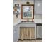 Kitchen sink with view to the outside featuring a faucet and blue cabinets at 102 Eastover Cir, Summerville, SC 29483