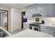 Well-lit kitchen with stainless steel appliances and white countertops at 102 Eastover Cir, Summerville, SC 29483