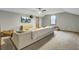 Spacious living area features plush carpeting, neutral walls, and comfortable seating arrangements at 102 Eastover Cir, Summerville, SC 29483