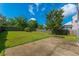 Well-maintained backyard with a concrete patio area and a classic wooden privacy fence at 1052 Whitlow Blvd, Summerville, SC 29483