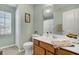 Bathroom featuring a toilet, vanity with a towel and window for natural light at 1052 Whitlow Blvd, Summerville, SC 29483