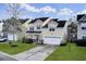 Inviting two-story home with a well-kept lawn, two-car garage, and charming entryway at 1052 Whitlow Blvd, Summerville, SC 29483