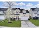 Charming two-story home with a well-manicured lawn and a two-car garage at 1052 Whitlow Blvd, Summerville, SC 29483