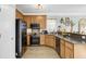 Well-equipped kitchen features wood cabinetry, stainless steel appliances, and a practical layout at 1052 Whitlow Blvd, Summerville, SC 29483